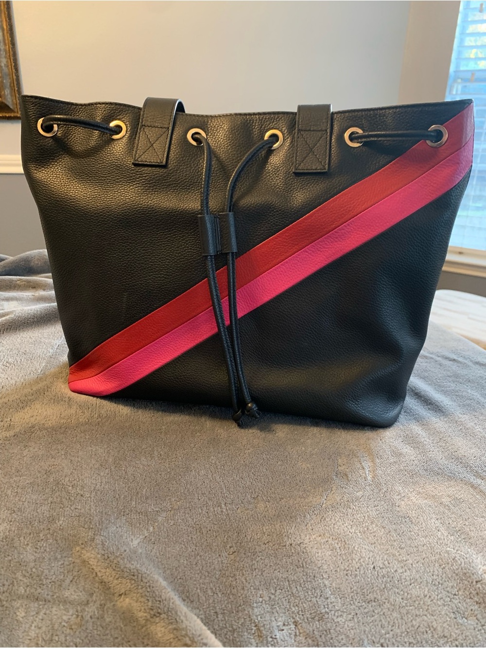 Black Leather Tote with Diagonal Pink and Red Accent Stripes